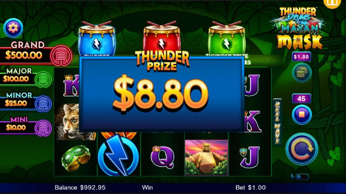 Tampilan visual slot Thunder Drums Mayan Mask dengan latar belakang kuil kuno dan simbol topeng emas.